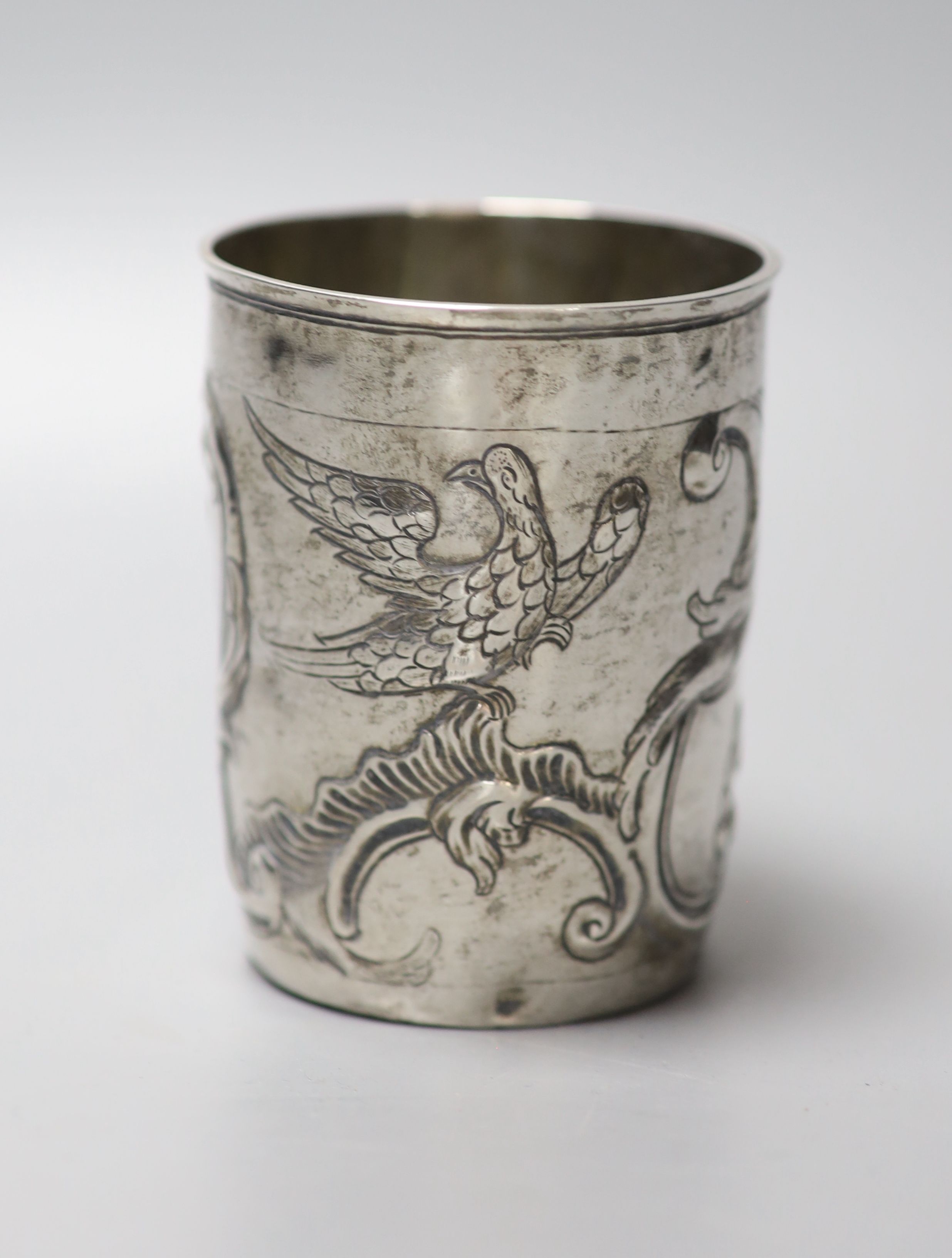 A late 18th century Russian embossed white metal beaker, assay master Alexei Viklyayev?, Moscow, 1790, 87mm, 91 grams.